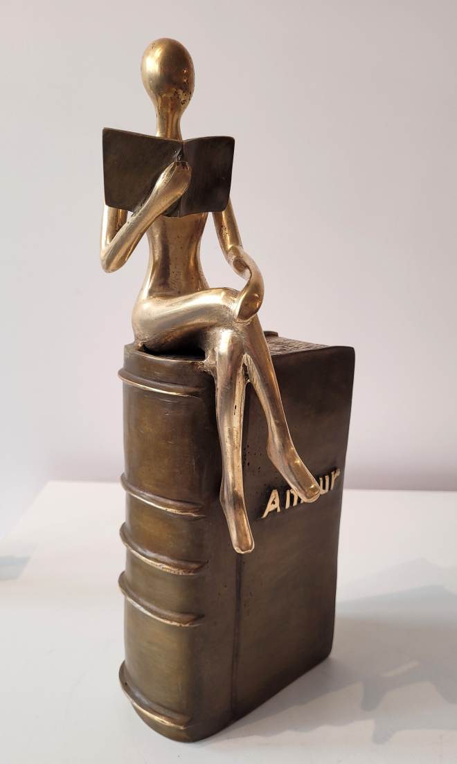 Lectrice bord de livre-Carl JAUNAY