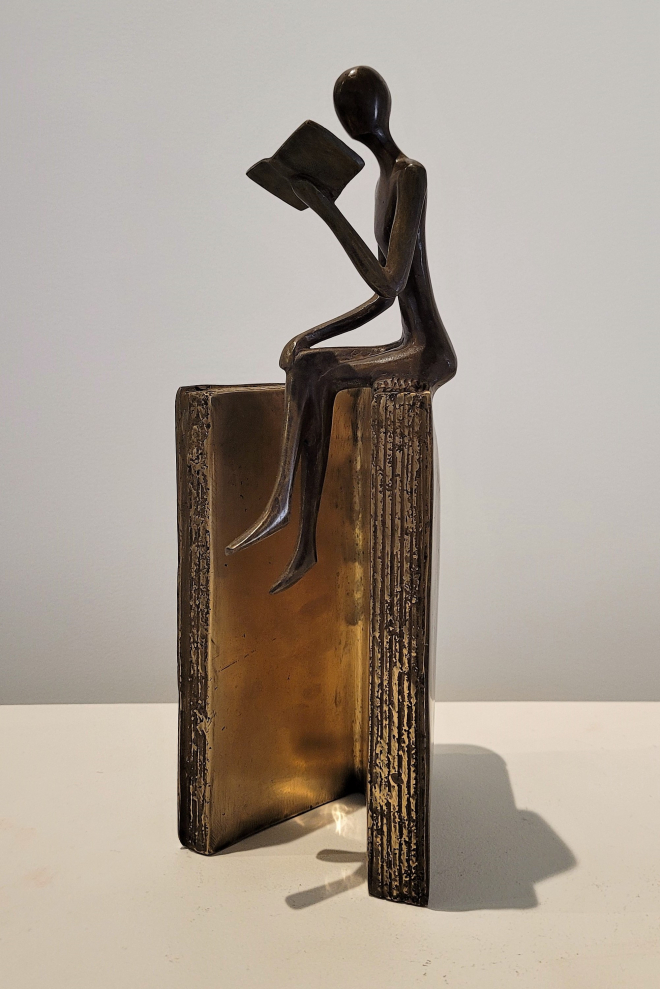 Liseuse sur bord de livre - Bronze-Carl JAUNAY