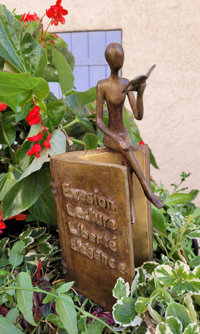 Liseuse sur bord de livre - Bronze-Carl JAUNAY